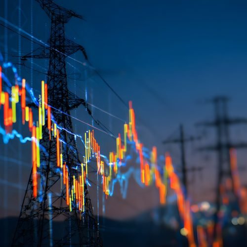 A digital stock market graph with an electric power grid in the background,